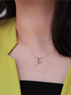 Collier nœud stylisé rosé